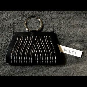 A cute black bedazzled purse from Alisha’s boutique